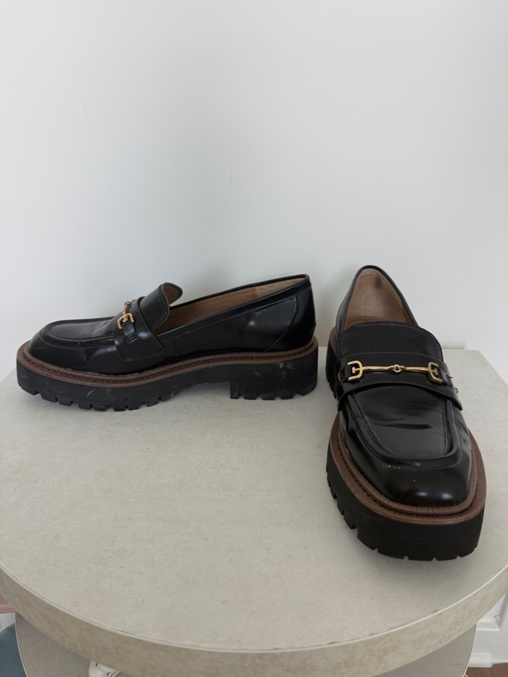 Black Women’s Lug Sole Loafers with Gold Bit Hardware
